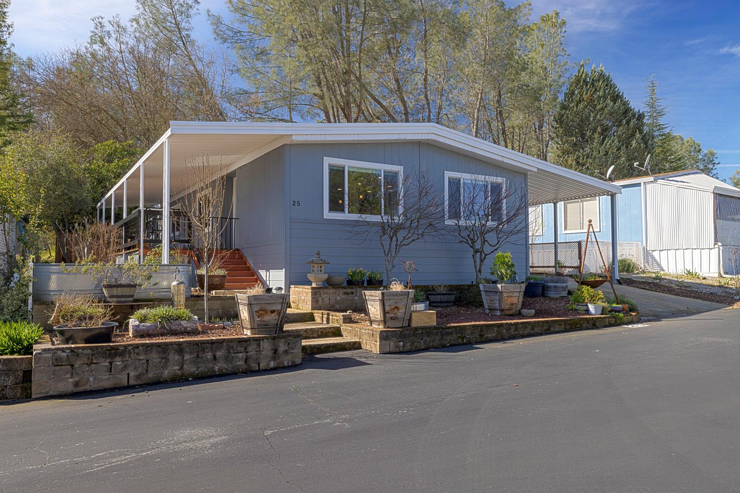 1330 Calaveritas Road, Unit 25 San Andreas, CA 95249 - Photo 4 of 43 a view of house with outdoor space and car parked