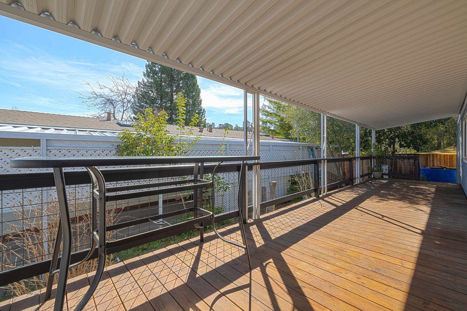 1330 Calaveritas Road, Unit 25 San Andreas, CA 95249 - Photo 6 of 43 a view of a balcony with wooden floor