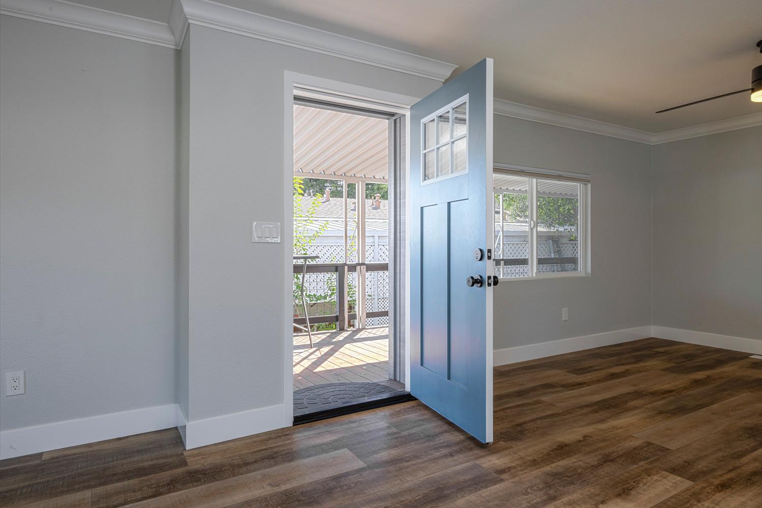 1330 Calaveritas Road, Unit 25 San Andreas, CA 95249 - Photo 8 of 43 a view of hallway with window and wooden floor