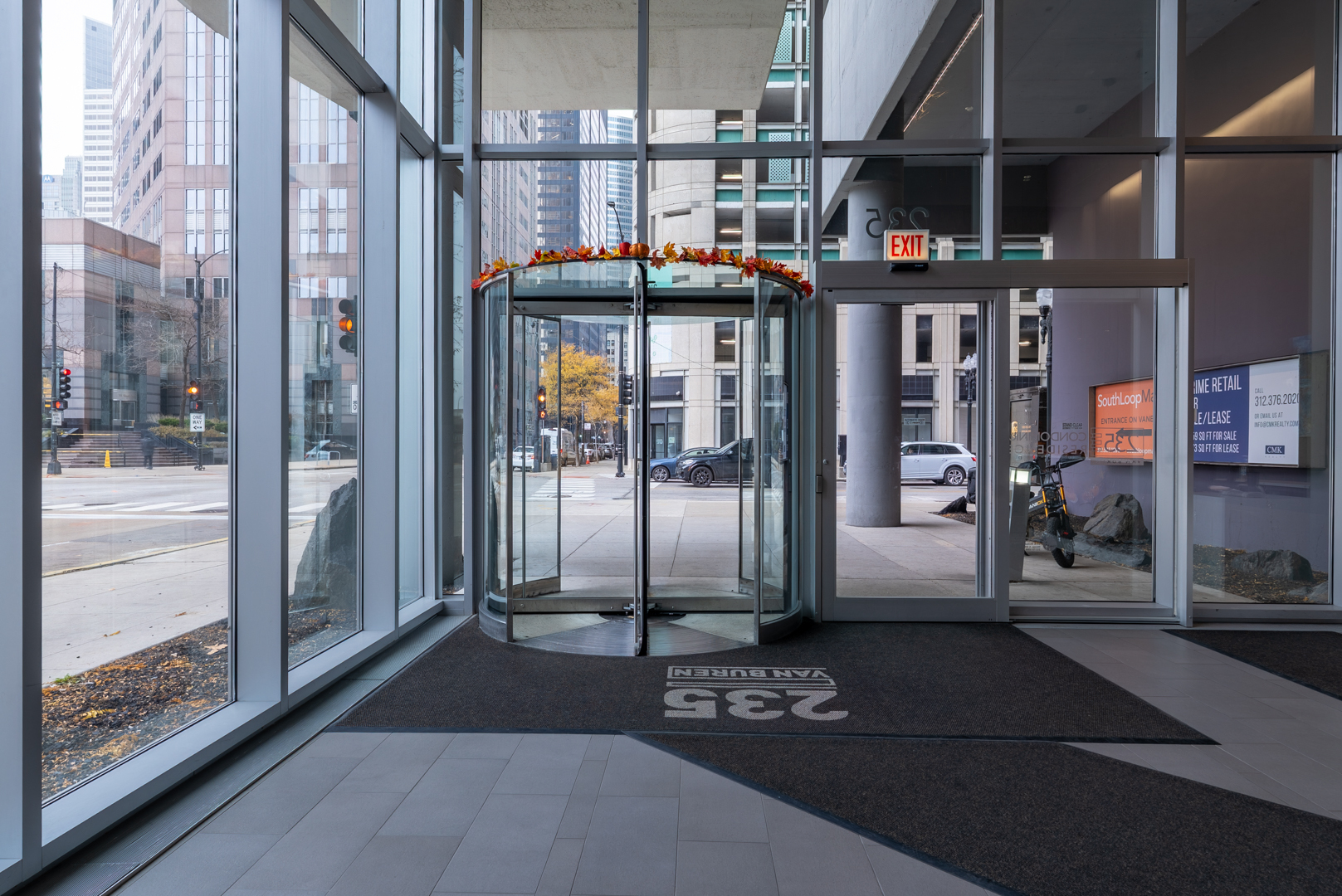 235 West Van Buren Street, Unit 1809 Chicago, IL 60607 - Photo 2 of 17 a view of a street with a building and a street