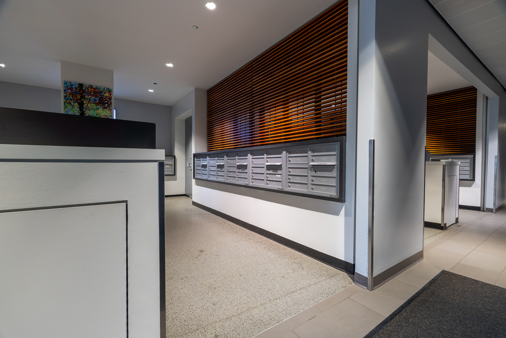 235 West Van Buren Street, Unit 1809 Chicago, IL 60607 - Photo 5 of 17 a view of kitchen with refrigerator and cabinets