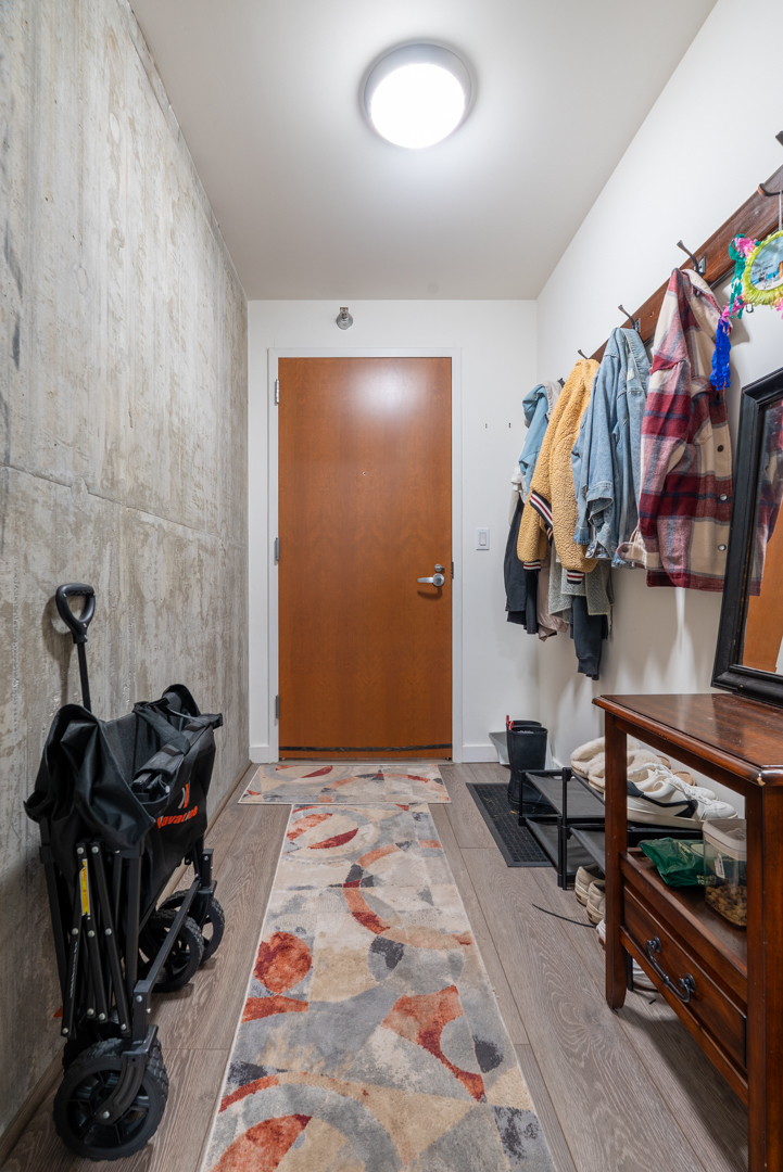 235 West Van Buren Street, Unit 1809 Chicago, IL 60607 - Photo 6 of 17 a view of a room with gym equipment