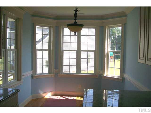84 South Sunset Ridge Drive Willow Spring, NC 27592 - Photo 5 of 21 a view of an empty room with windows
