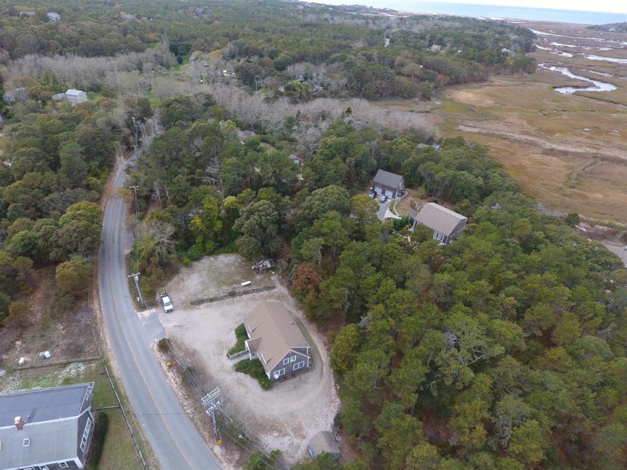 1 Depot Road Truro, MA 02666 - Photo 3 of 8 an aerial view of a house with a yard