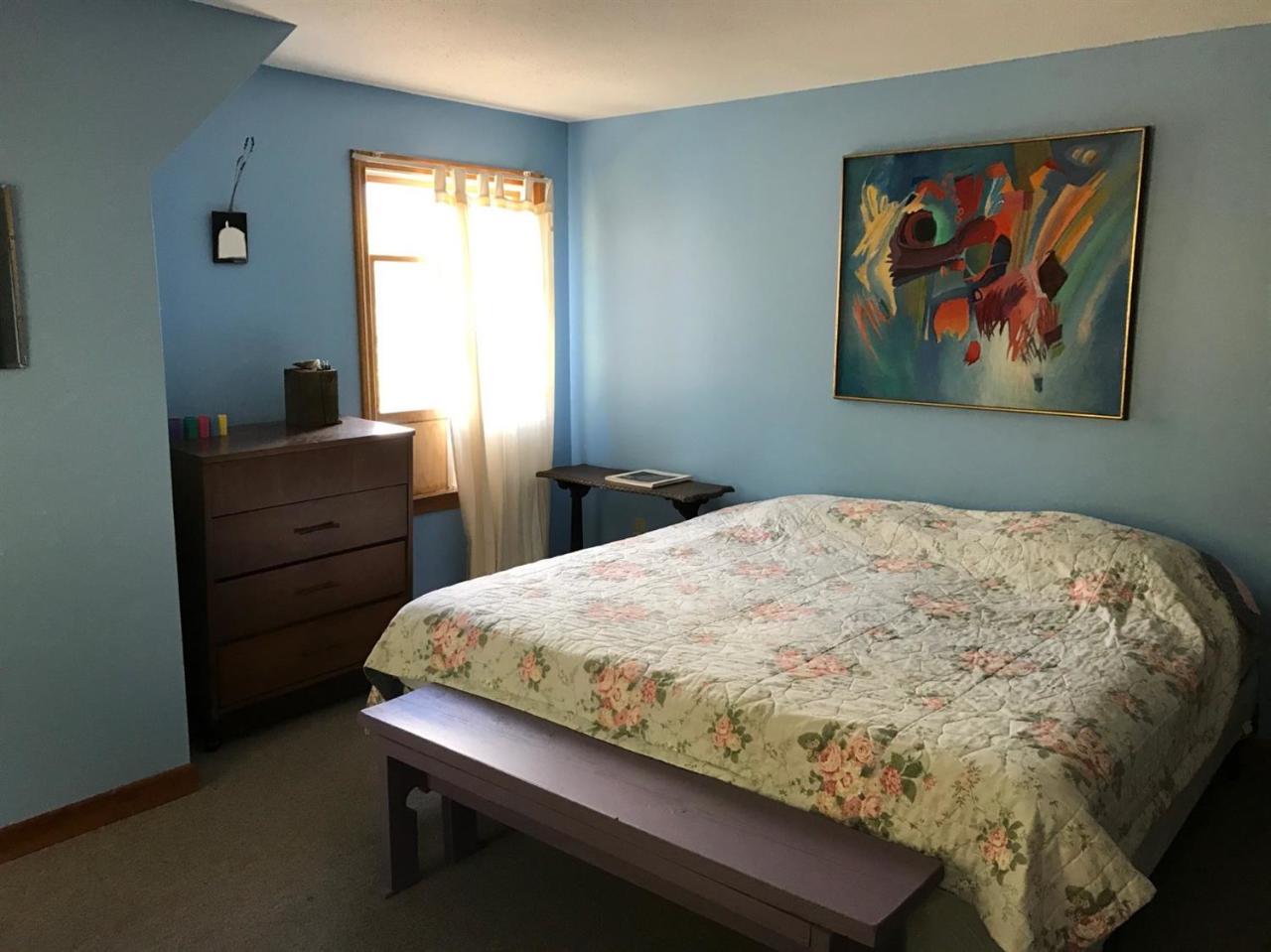 1 Depot Road Truro, MA 02666 - Photo 6 of 8 a bedroom with a bed and a window