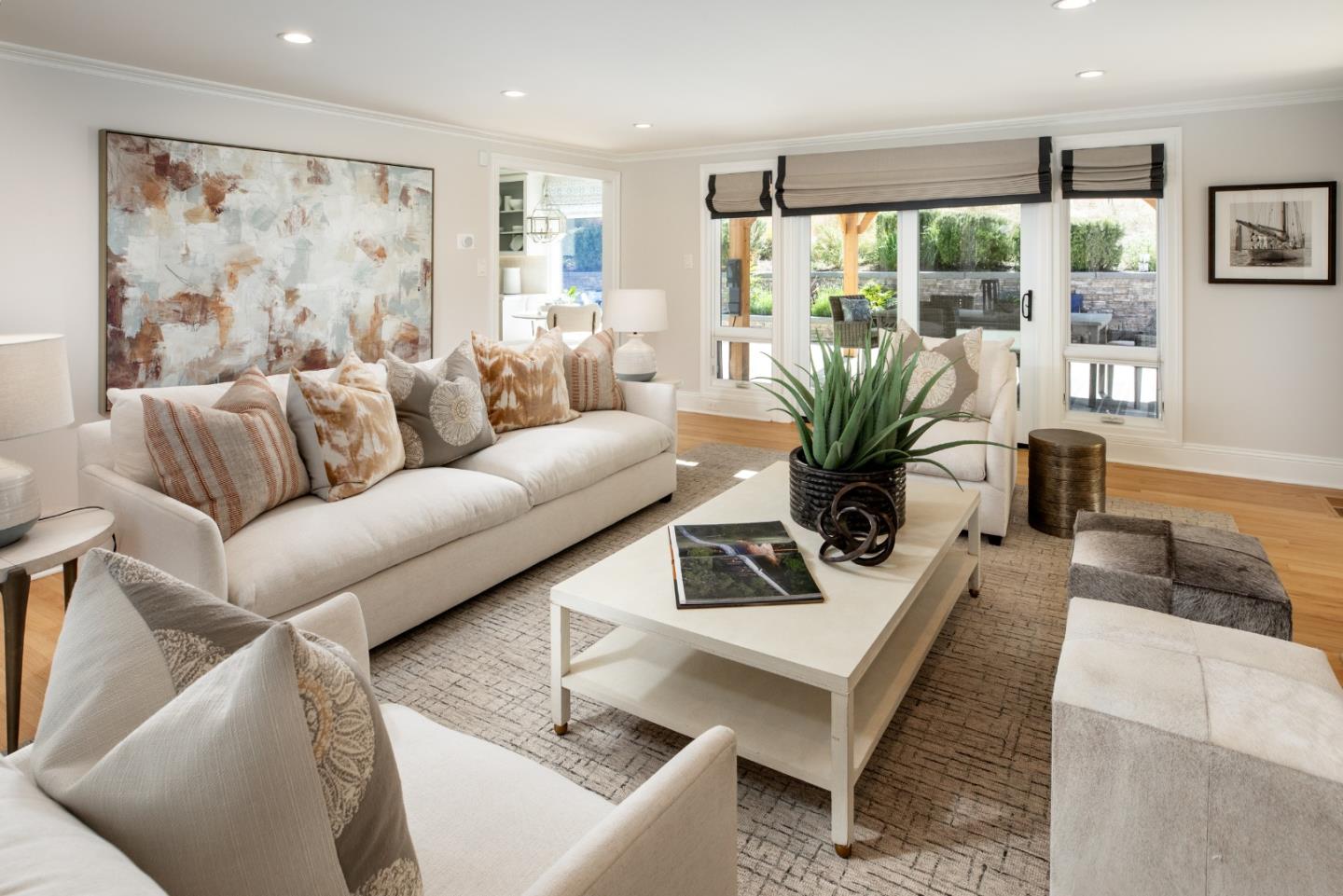 345 Harcross Road Woodside, CA 94062 - Photo 11 of 37 a living room with furniture and large windows