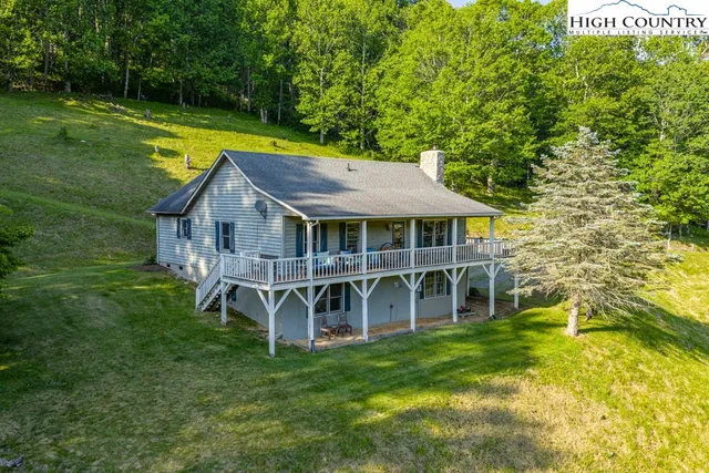 a view of a house with a swimming pool