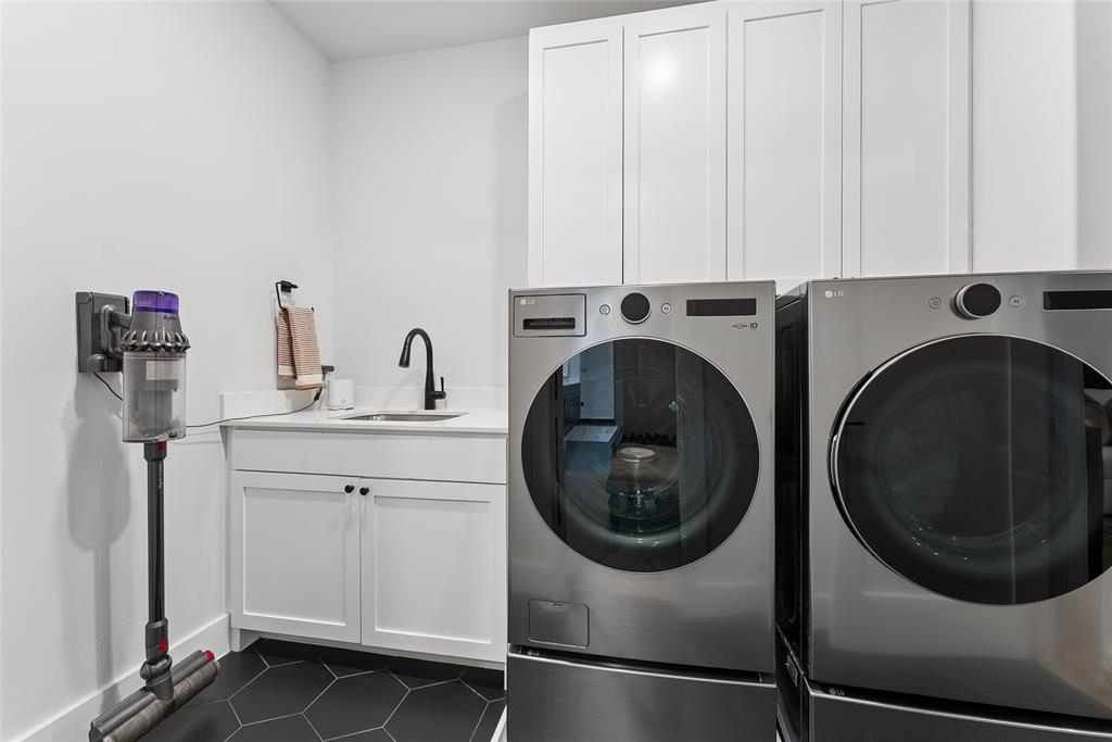 3922 Redding Row Dallas, TX 75220 - Photo 26 of 35 a utility room with sink dryer and washer