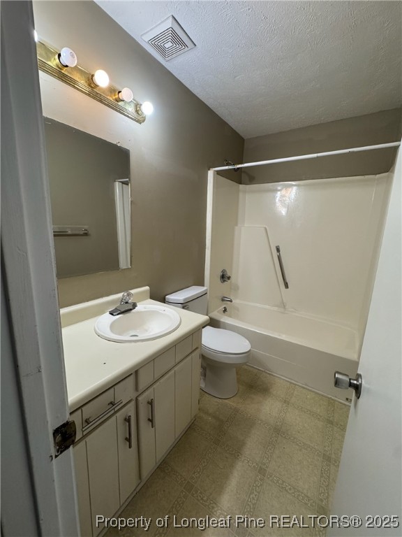 1424 Tangora Lane Fayetteville, NC 28304 - Photo 5 of 6 a bathroom with a sink and mirror with toilet