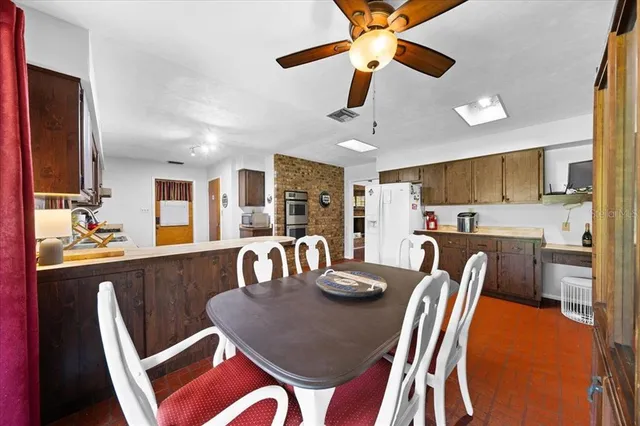 a backyard of a house with seating space