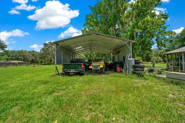 a view of a golf course with a lake