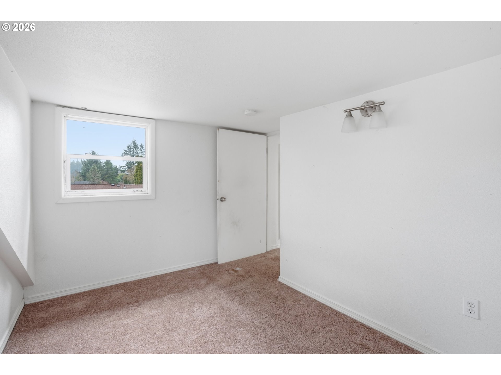 40 Southeast 133rd Avenue, Unit B Portland, OR 97233 - Photo 19 of 24 a view of an empty room