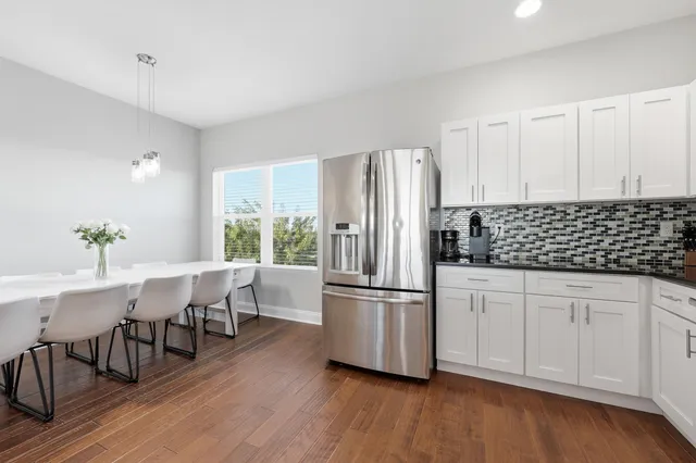 a view of a balcony with furniture