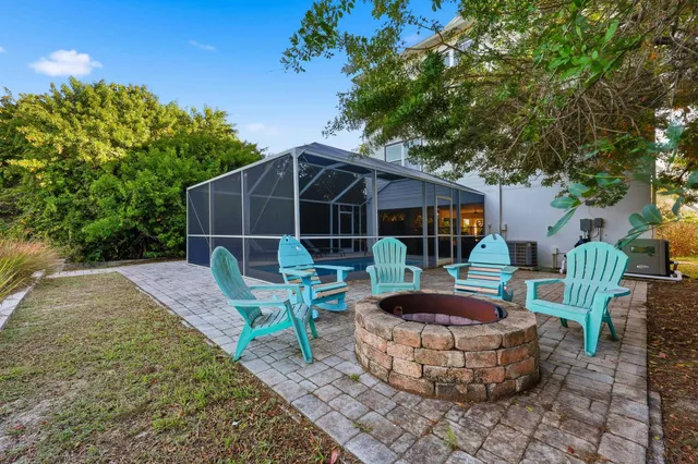 an aerial view of a house with a garden