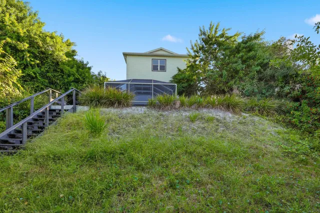 a view of a balcony with wooden floor