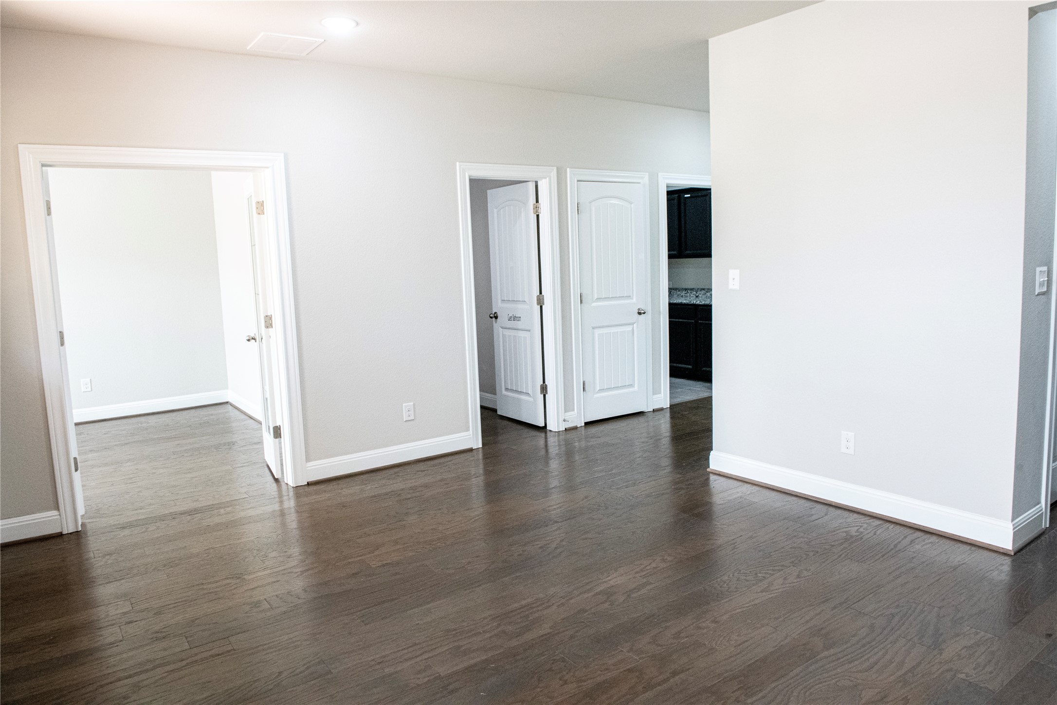 2260 Hat Bender Loop Round Rock, TX 78664 - Photo 28 of 40 an empty room with wooden floor & windows