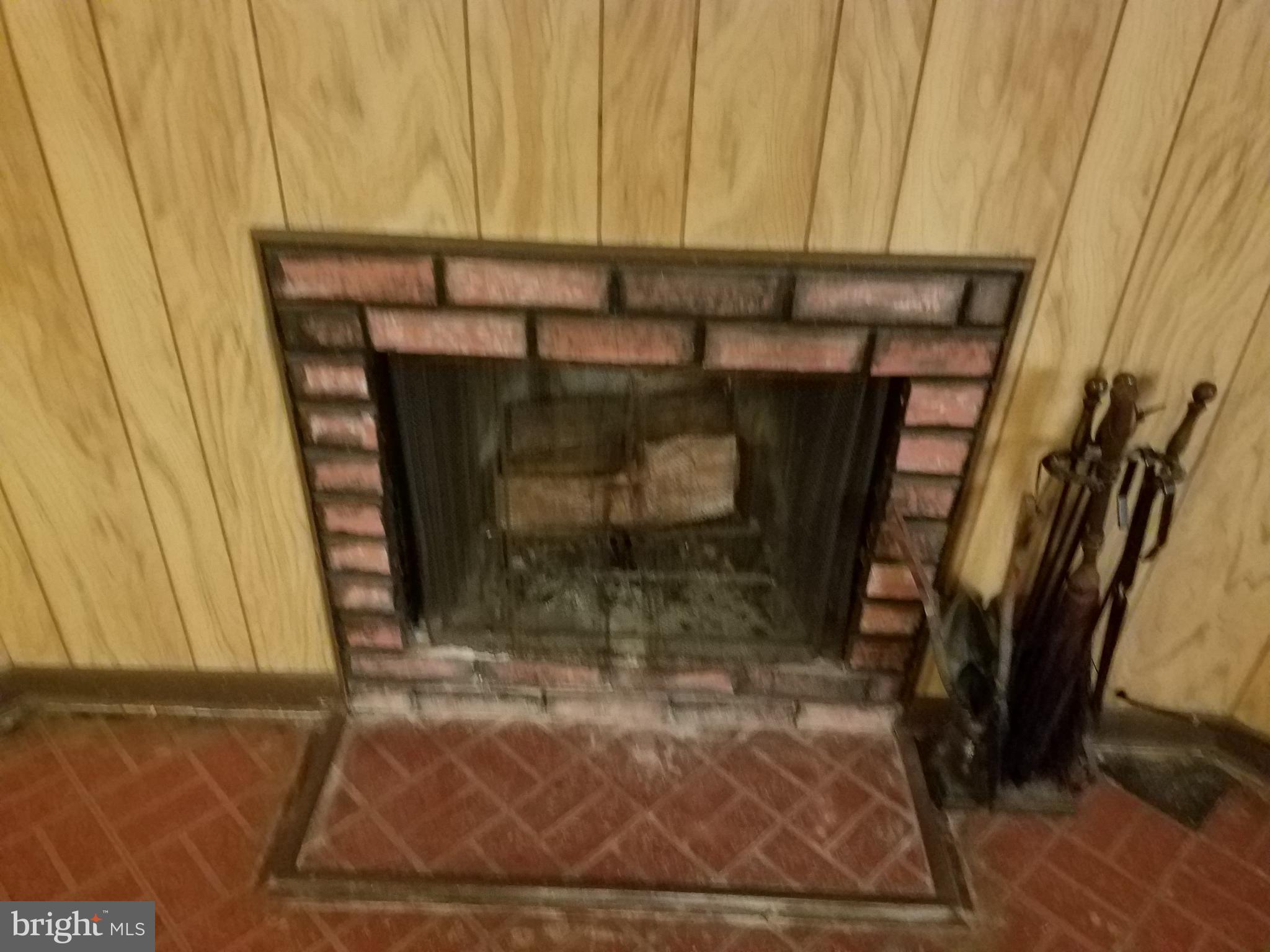 8906 Trimble Way Rosedale, MD 21237 - Photo 17 of 25 Wood Burning Fire Place