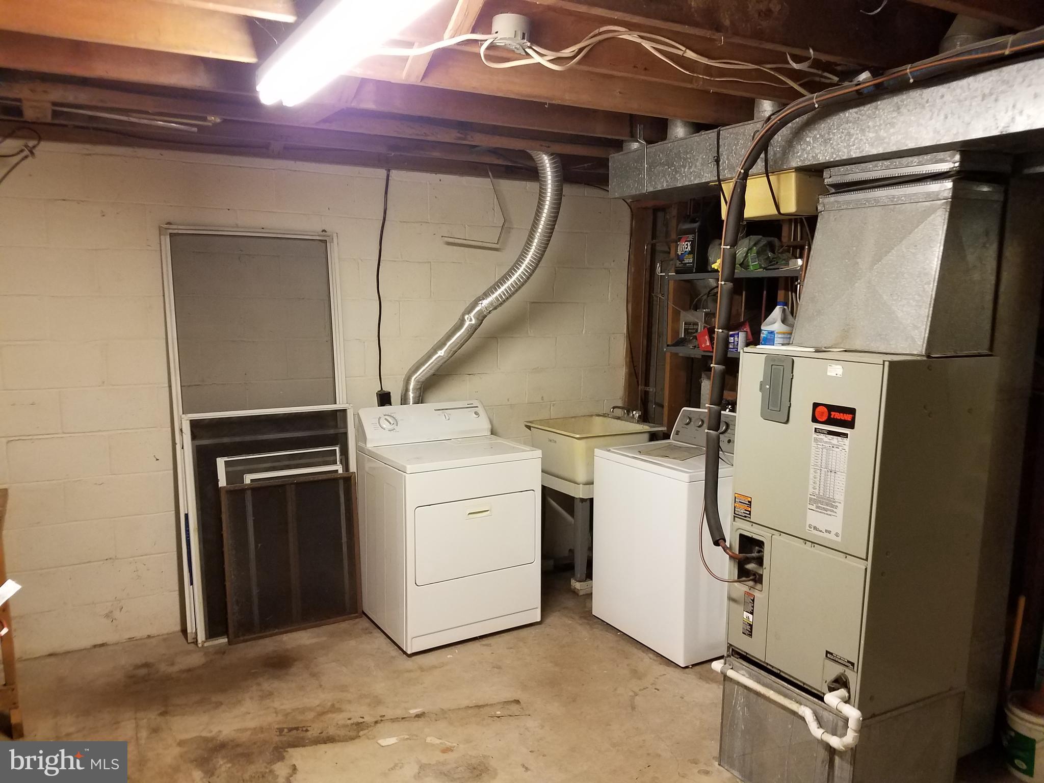 8906 Trimble Way Rosedale, MD 21237 - Photo 19 of 25 Laundry/ Utility Room with Laundry Tra