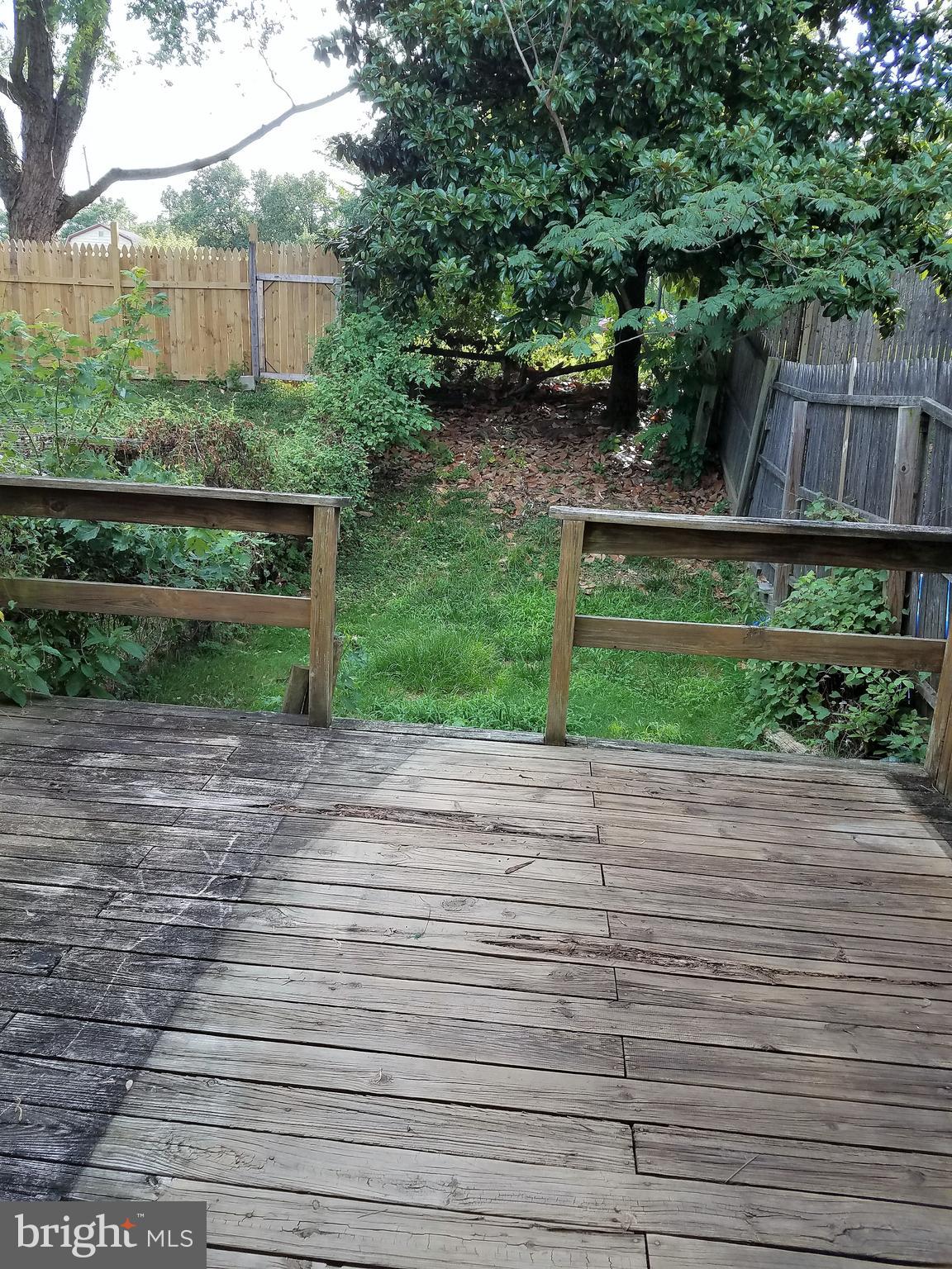 8906 Trimble Way Rosedale, MD 21237 - Photo 20 of 25 Rear Lawn and Deck