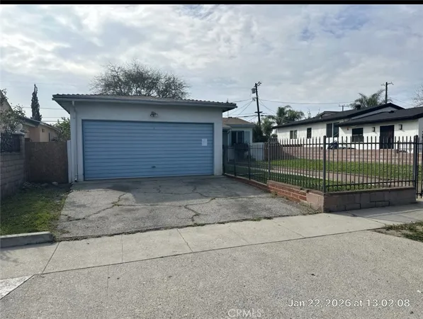a view of a house with a garage