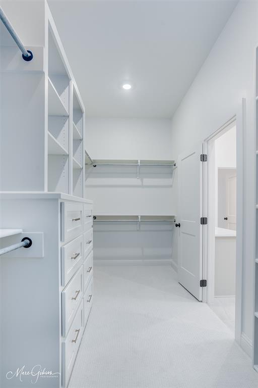 192 St Andrews Benton, LA 71006 - Photo 18 of 26 a view of walk in closet with empty racks