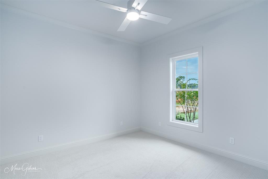 192 St Andrews Benton, LA 71006 - Photo 20 of 26 an empty room with a window and a fan