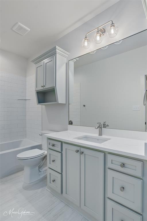 192 St Andrews Benton, LA 71006 - Photo 22 of 26 a bathroom with a toilet sink and mirror