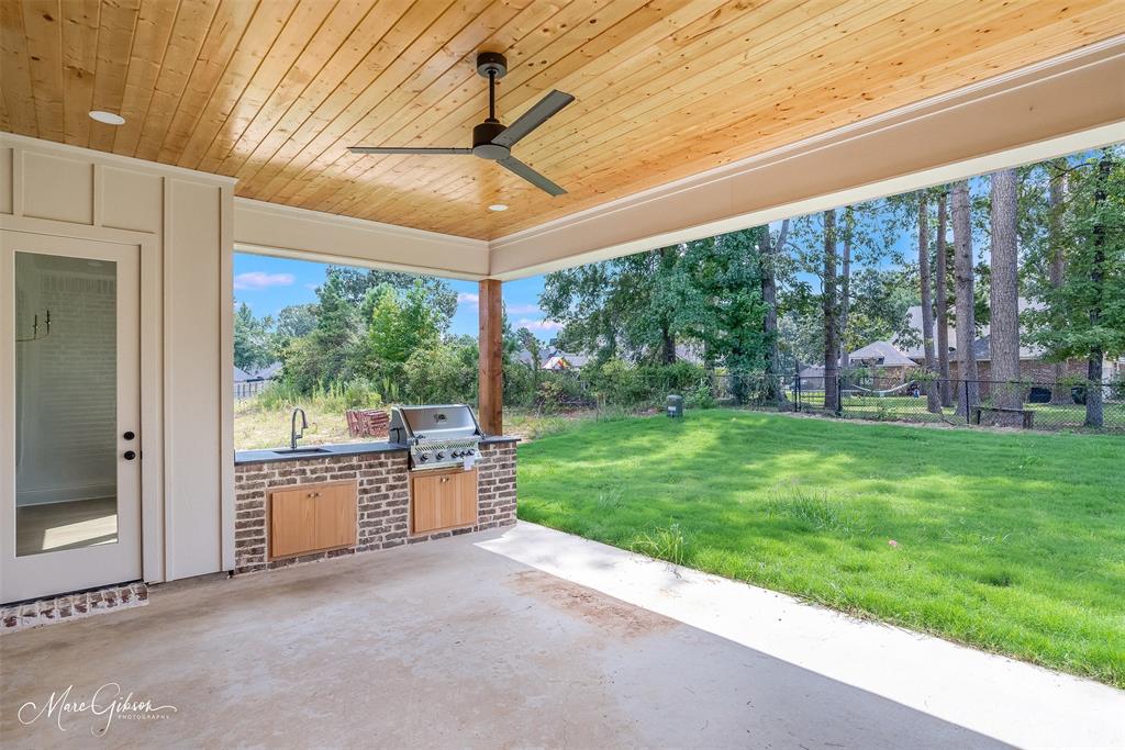 192 St Andrews Benton, LA 71006 - Photo 25 of 26 a very nice looking yard with a large window and stainless steel appliances