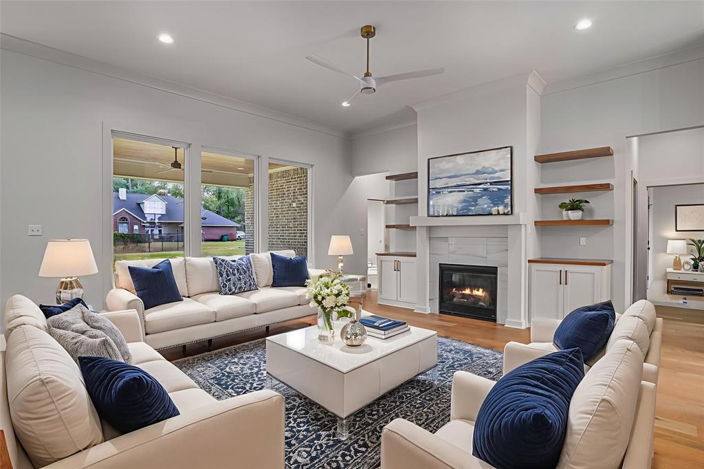 192 St Andrews Benton, LA 71006 - Photo 3 of 26 a living room with furniture and a fireplace