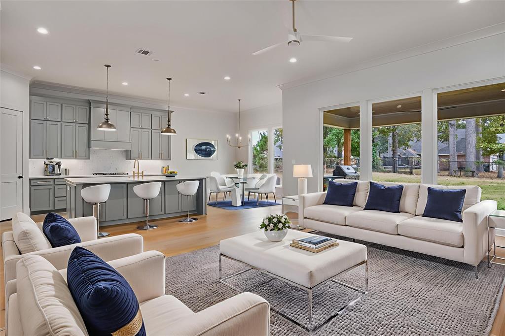 192 St Andrews Benton, LA 71006 - Photo 4 of 26 a living room with furniture kitchen view and a large window