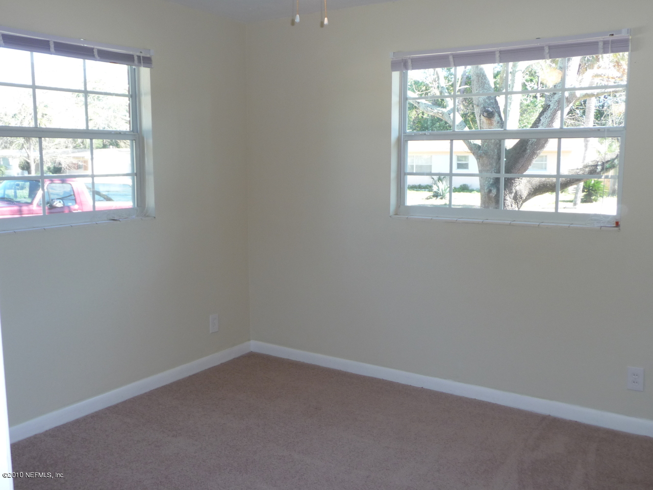 3384 Rogero Road Jacksonville, FL 32277 - Photo 13 of 17 an empty room with a window