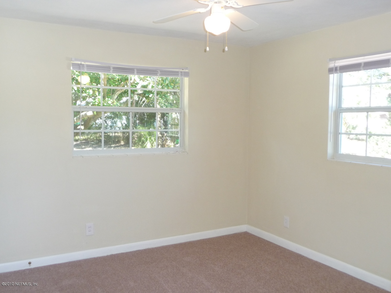 3384 Rogero Road Jacksonville, FL 32277 - Photo 9 of 17 an empty room with a window