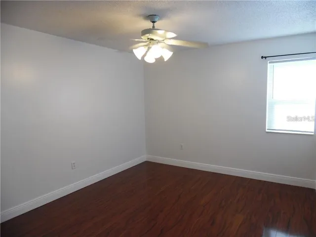 a view of a windows and chandelier in a room
