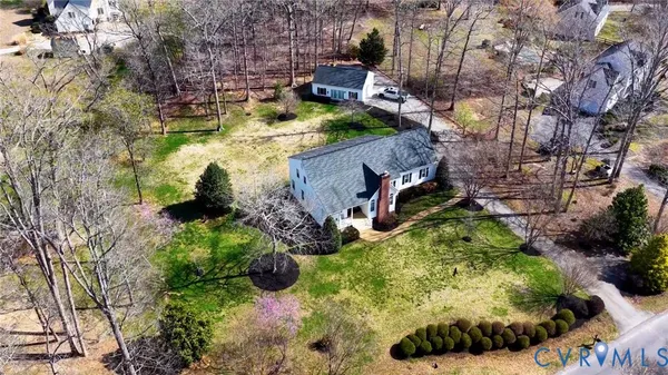 a kitchen with a stove a sink and a microwave