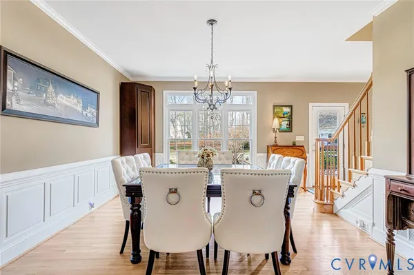 a kitchen with stainless steel appliances kitchen island granite countertop a sink and cabinets