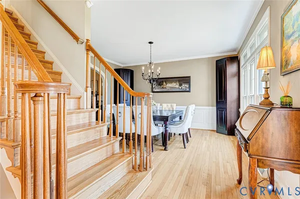 a bathroom with a granite countertop sink and a window