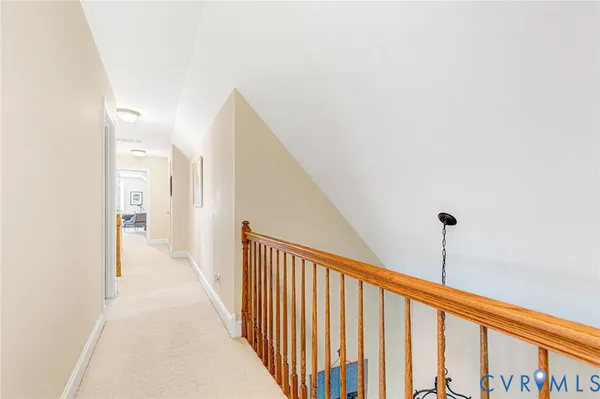 a view of a swimming pool with lounge chairs