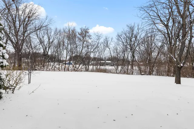 a view of snow covered with snow in front of yard
