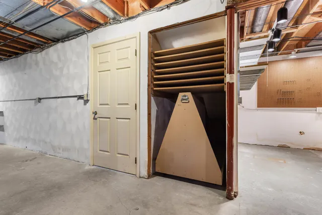 a view of an empty room with a utility room