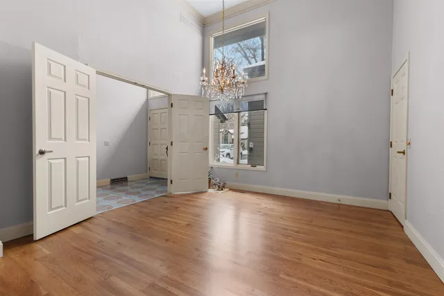 a view of livingroom with hardwood floor and hallway