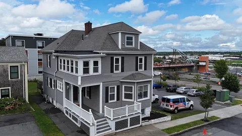 a car parked in front of a house