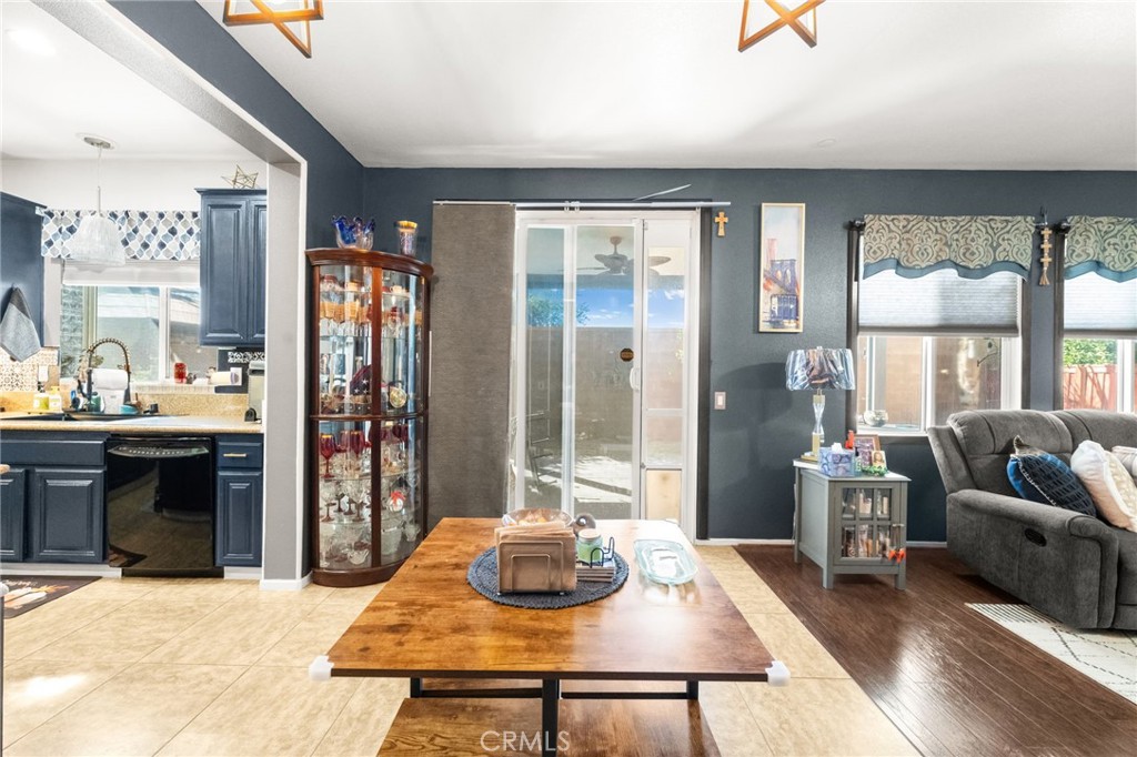 38327 Rancho Vista Drive Beaumont, CA 92223 - Photo 18 of 48 a living room with furniture and a fireplace