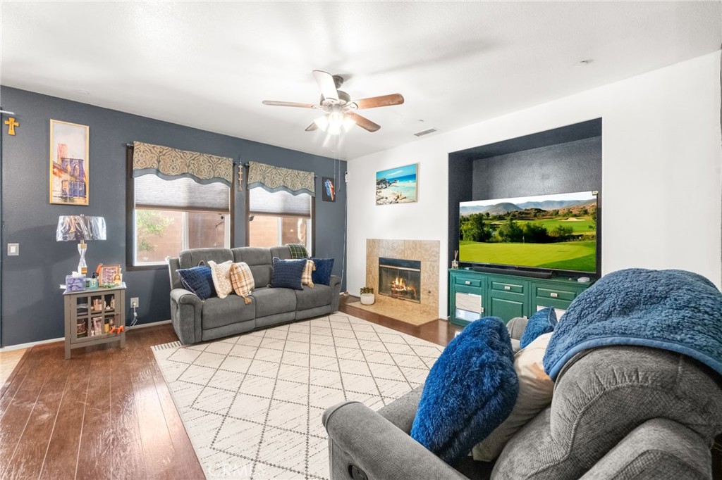 38327 Rancho Vista Drive Beaumont, CA 92223 - Photo 21 of 48 a living room with furniture and a flat screen tv