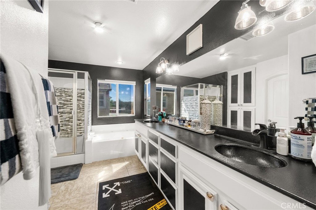 38327 Rancho Vista Drive Beaumont, CA 92223 - Photo 33 of 48 a large white kitchen with granite countertop a lot of counter space