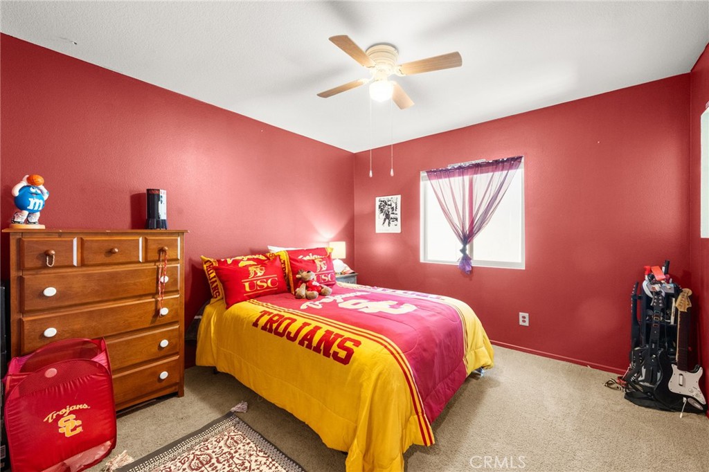 38327 Rancho Vista Drive Beaumont, CA 92223 - Photo 39 of 48 a bedroom with a bed and a window
