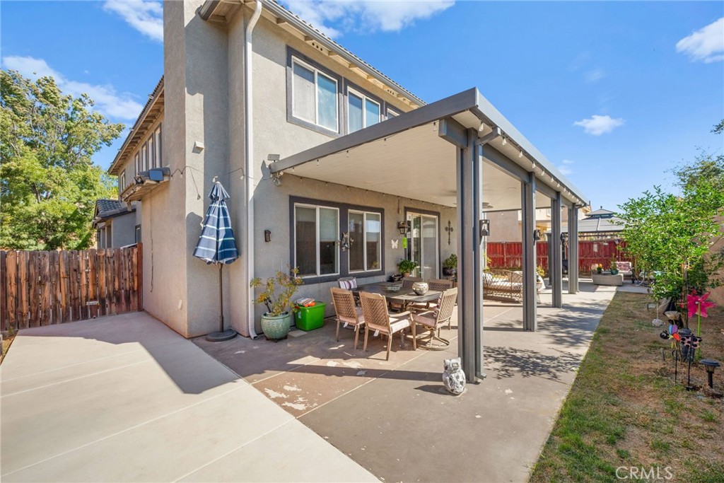 38327 Rancho Vista Drive Beaumont, CA 92223 - Photo 46 of 48 a view of a house with a yard and sitting area