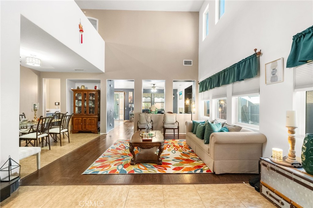 38327 Rancho Vista Drive Beaumont, CA 92223 - Photo 10 of 48 a living room with furniture and a table