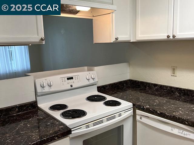 3641 Clayton Road, Unit 34 Concord, CA 94521 - Photo 5 of 16 a kitchen with a stove and a microwave