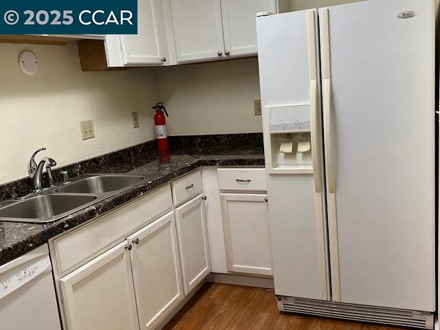 3641 Clayton Road, Unit 34 Concord, CA 94521 - Photo 6 of 16 a kitchen with granite countertop a sink and cabinets