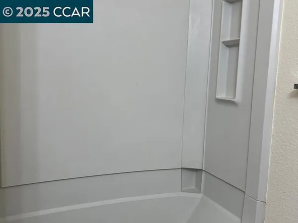 a bathroom with a bathtub